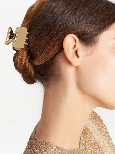 haine prada|Prada hair clips.